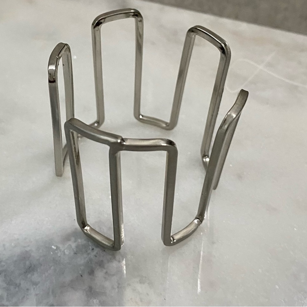 Silver tone bangle bracelet New never worn.
